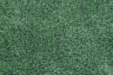 Arkaplan ve doku için yapay yeşil çim. metin için boşluk kopyala