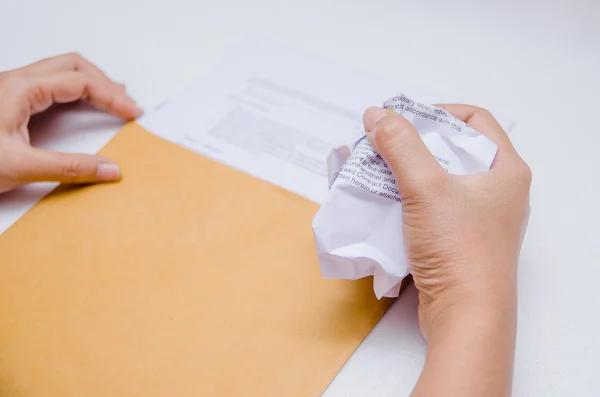 Crumpled paper in hand — Stock Photo, Image