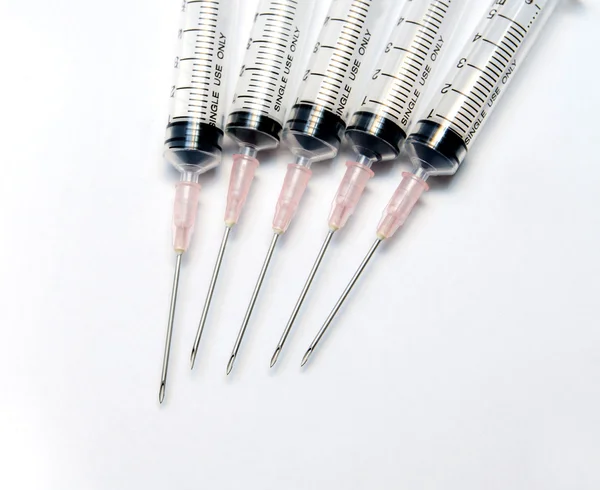 Close-up of medical syringe in row — Stock Photo, Image