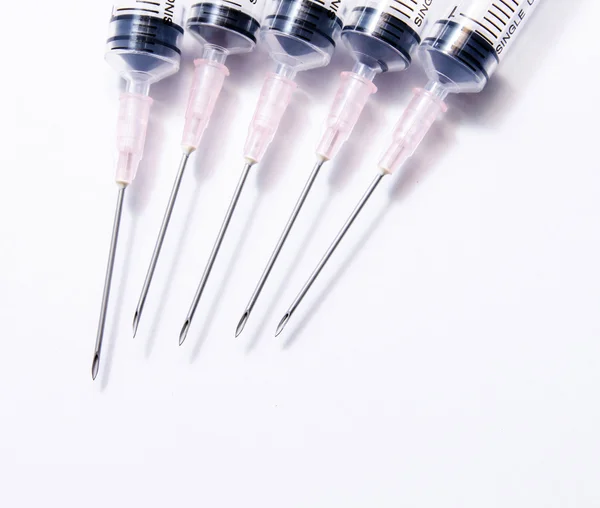 Close-up da seringa médica em linha — Fotografia de Stock