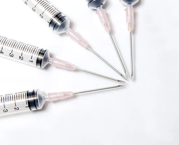Close-up of medical syringe in row — Stock Photo, Image