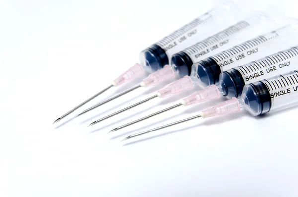 Close-up of medical syringe in row — Stock Photo, Image