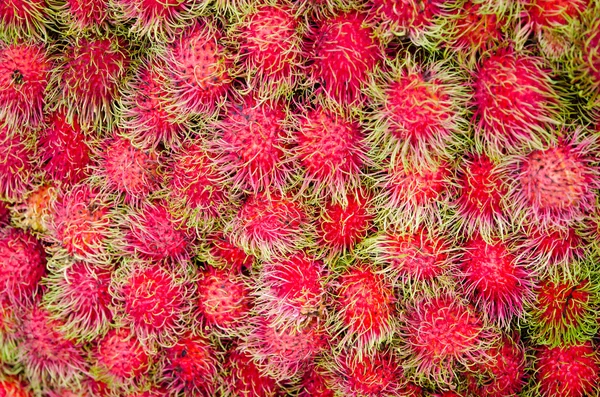 Verse rambutan op de markt — Stockfoto