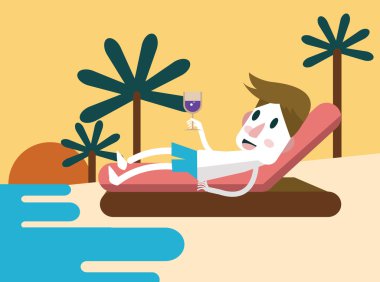 rahatlatıcı ve şarap kadehinin ile sahilde zevk genç adam.