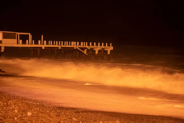 storm at sea at night, long exposure