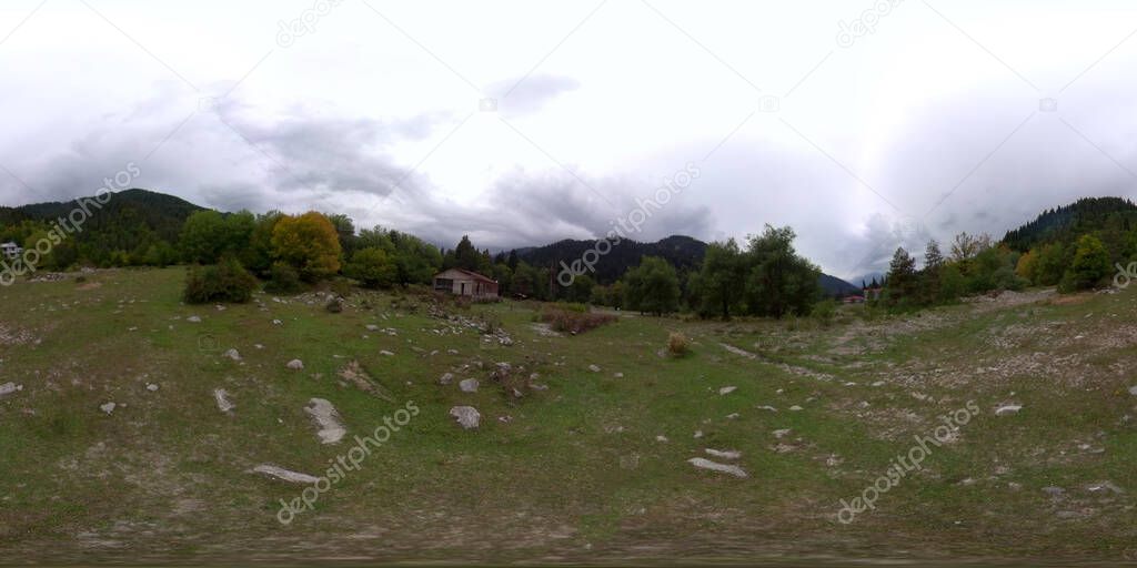 Panorama 360 in a mountain village in cloudy weather