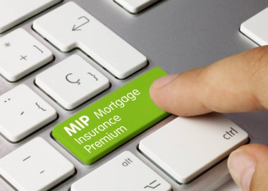 MIP ipotek sigortası primi Metalik Klavyenin Yeşil Anahtarı üzerine yazıldı. Parmak tuşuna bas.