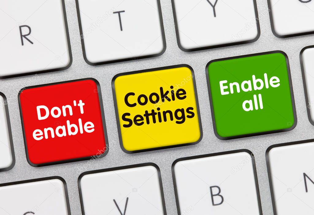 Don't enable - Cookie Settings - Enable all Written on multicolor Key of Metallic Keyboard. Finger pressing key.