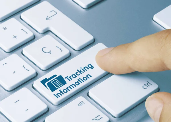 Tracking Information Written Blue Key Metallic Keyboard Finger Pressing Key — Stockfoto