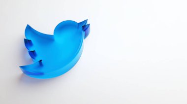 Valencia, İspanya - Ekim 2021: İzole edilmiş Twitter logosu kuş simgesi, beyaz fotokopi uzayındaki akıllı telefonların mavi sembolü. Mikroblog yazma ve mesajları paylaşma için ücretsiz sosyal medya ağı uygulaması