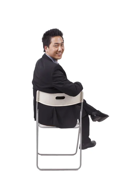 Businessman sitting posture — Stock Photo, Image