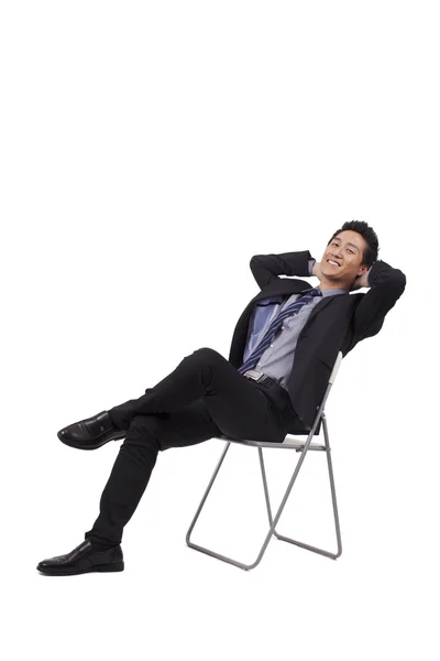 Uomo d'affari seduto postura — Foto Stock