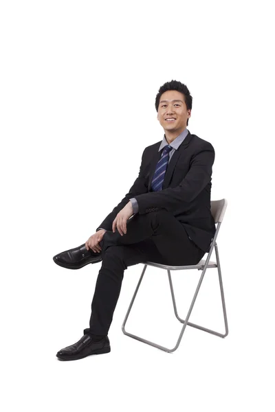 Businessman sitting posture — Stock Photo, Image