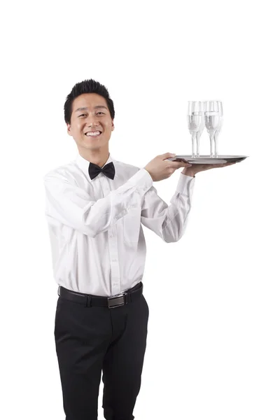 Camarero llevando botella de vino — Foto de Stock
