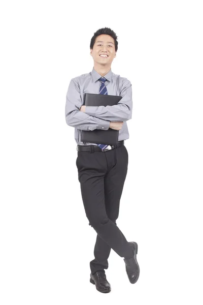 Asiático hombre de negocios sosteniendo un blanco — Foto de Stock