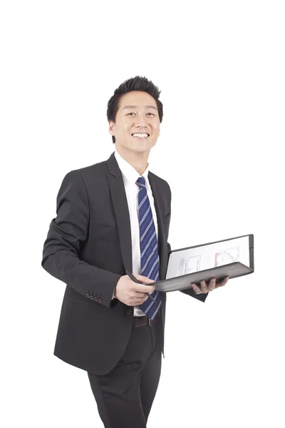 Asiático hombre de negocios sosteniendo un blanco — Foto de Stock