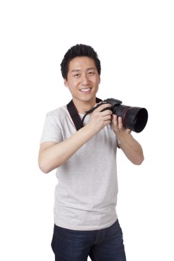 Asian young man photographer clipart