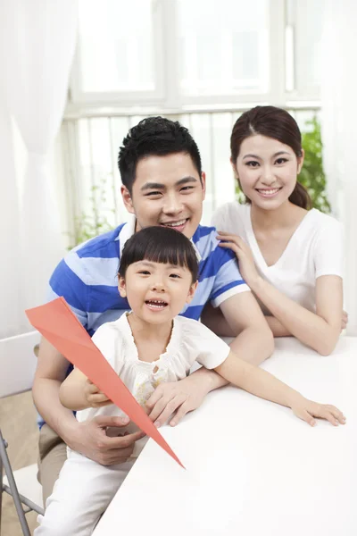 Family palying paper airplane — Stock Photo, Image