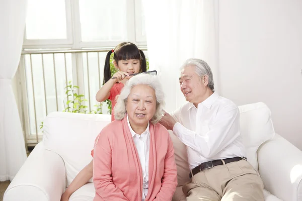 Couple with granddaughter — Stock Photo, Image