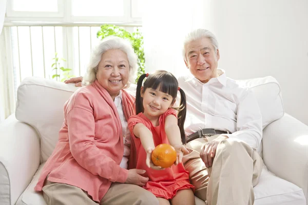 Couple with granddaughter — Stock Photo, Image