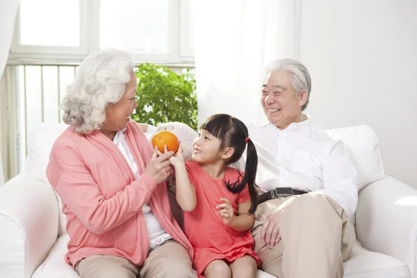 Couple with granddaughter — Stock Photo, Image