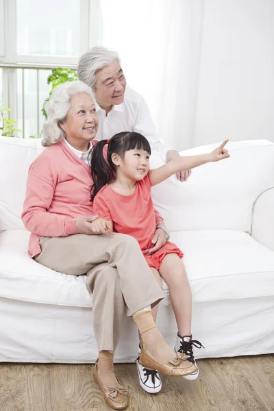 Couple with granddaughter — Stock Photo, Image