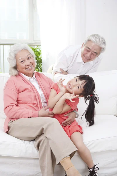 Couple with granddaughter — Stock Photo, Image