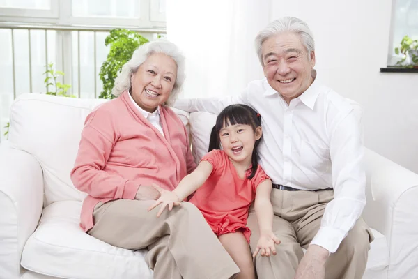 Couple with granddaughter — Stock Photo, Image