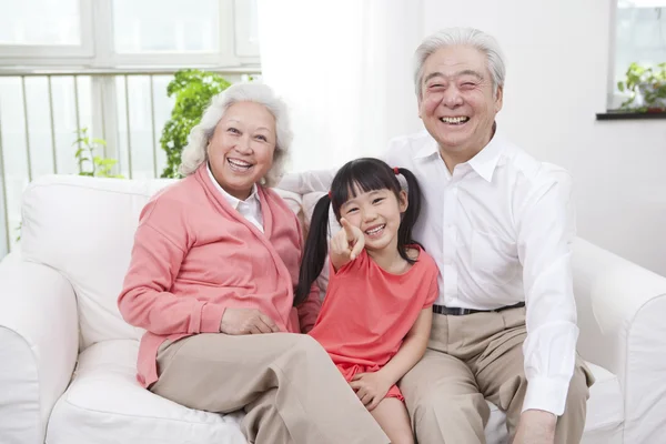 Couple with granddaughter — Stock Photo, Image