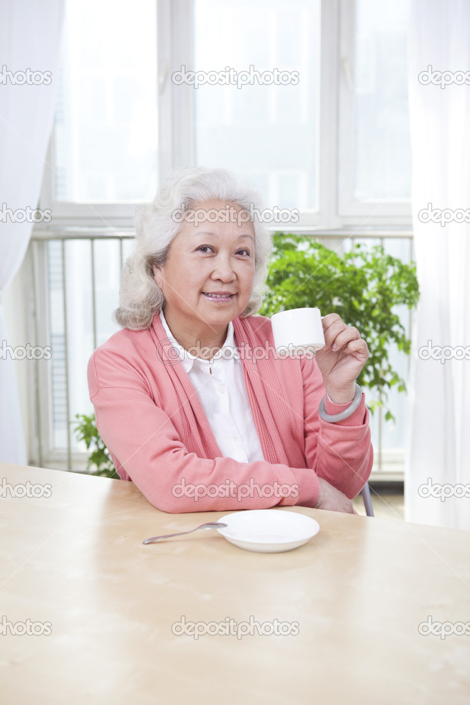 Woman holding a tea cup