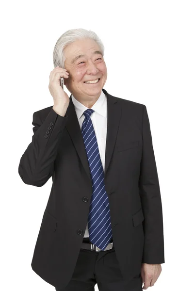 Hombre de negocios sénior usando teléfono inteligente —  Fotos de Stock