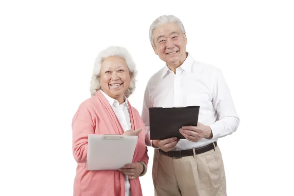 Couple holding questionnaire — Stock Photo, Image