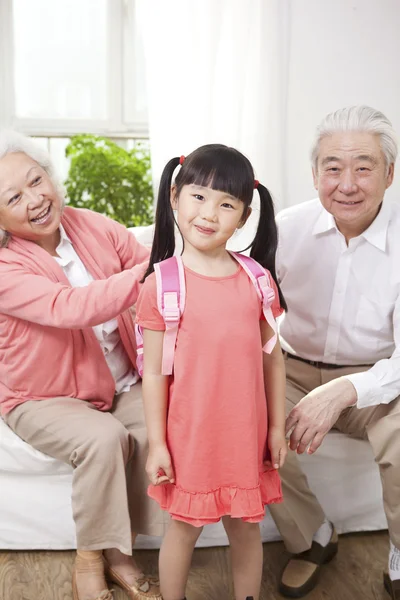 Couple with granddaughter playing — Stock Photo, Image