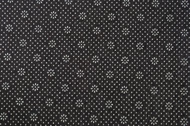 Beyaz arkaplandaki pamuk minderin üst görünümü.