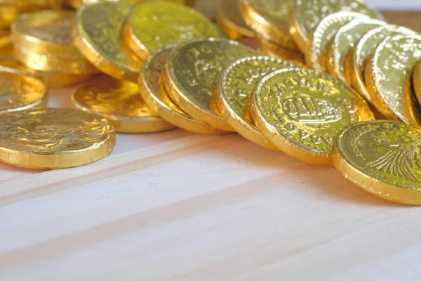 A pile of fake golden coins,business concept.