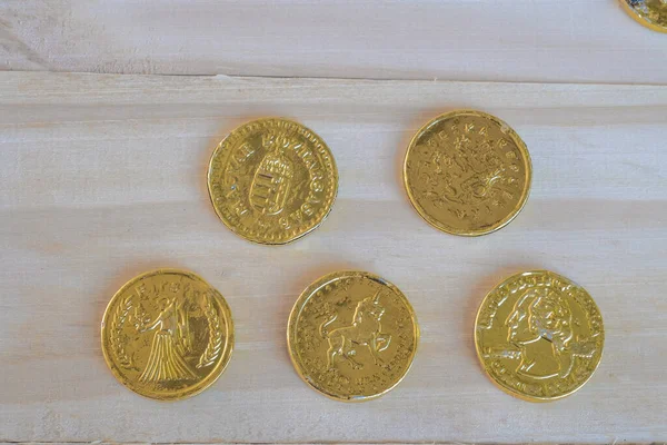 A pile of fake golden coins,business concept.