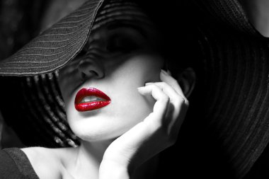 Mysterious woman in black hat. Red lips clipart
