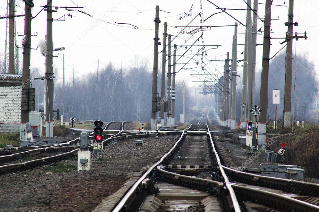 Railway tracks with crossings and semaphores.
