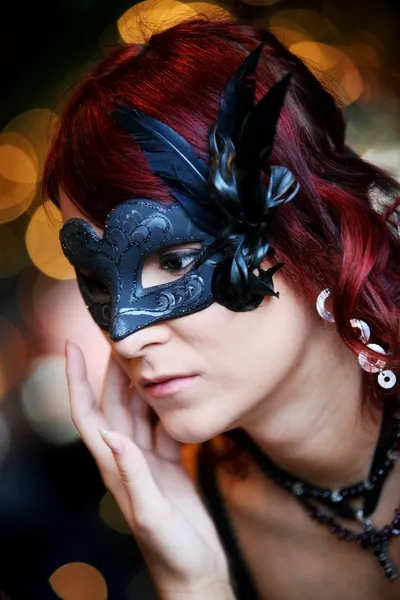 Woman wearing venetian mask — Stock Photo, Image