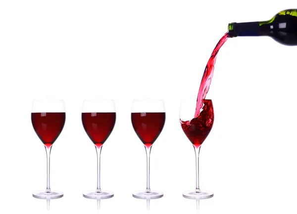 Rode wijn gieten in glas — Stockfoto