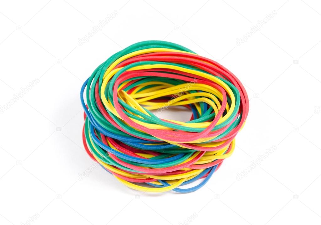 Lots of rubber bands of red, blue, yellow and green colors. 