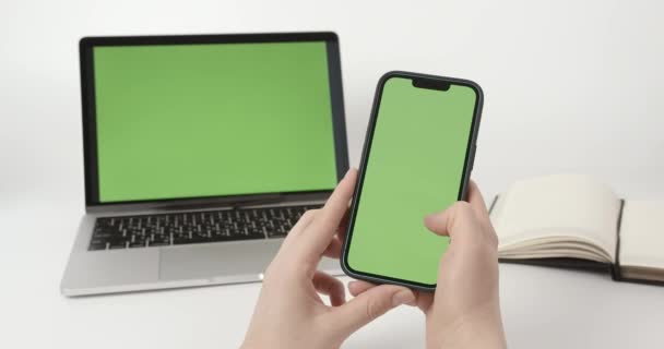 Chroma Key Mock Smartphone Laptop Female Hands Using Phone Green — Stock Video