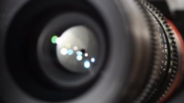 Close-up Lens Aperture Blades Opening. Turning Aperture Ring on Lens. Flare on Optical Lens Glasses