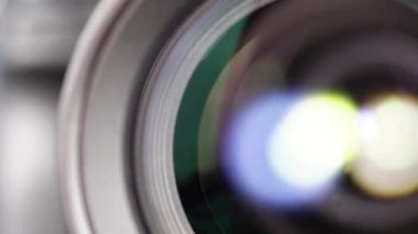Macro Shot of Camera Lens with Flare on Optical Glass. Process of Zooming Camera Lens