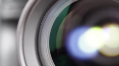 Macro Shot of Camera Lens with Flare on Optical Glass. Process of Zooming Camera Lens