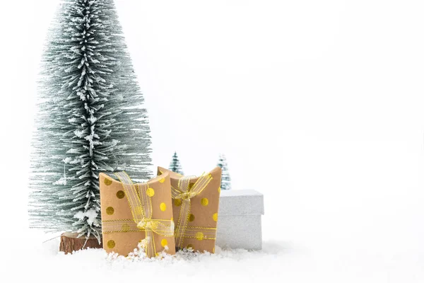 Horizontal christmas decoration on white background and snow — Stock Photo, Image