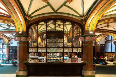 Barcelona, Spain - April 19 2022: Cafe with big decorated glass window in Palau de la Musica Opera in Barcelona, Spain