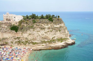 Tropea is a small town on the eastern coast of Calabria. It is known for its historic center on the cliffs, beaches and Saint Mary sanctuary.