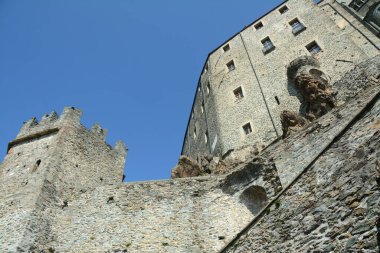 The Sacra di San Michele is a medieval abbey perched at 960 meters above sea level at the entrance to the Susa valley.