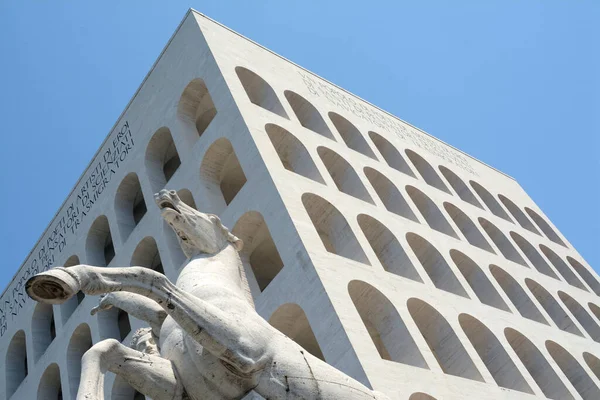 the Palazzo della Civilt Italiana is in Rome in the EUR district. Loved by the futurists for its abstract appearance, it is called by the Romans Colosseum square.